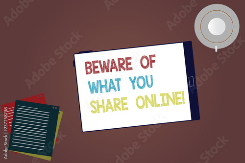 Word writing text Beware Of What You Share Online. Business concept for Be careful with the information you post Tablet Empty Screen Cup Saucer and Filler Sheets on Blank Color Background