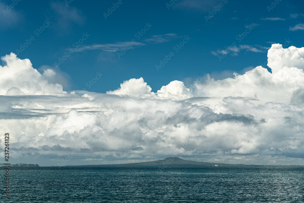 Beautiful sea and cloudy sky, New Zealand. View from Whangaparaoa Peninsula.