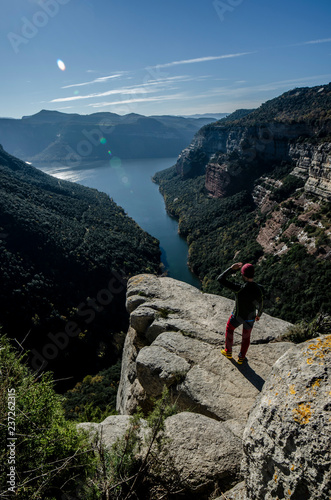 man on top of mountain