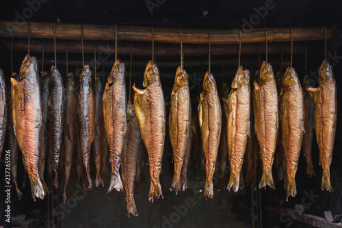Fish hot smoking in large traditional oven