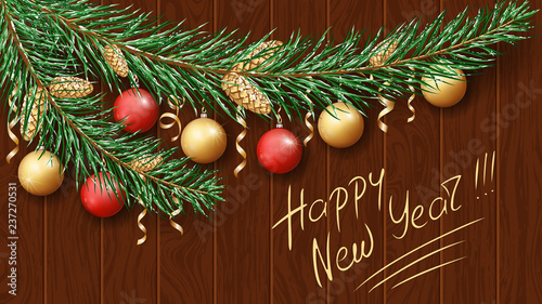 Merry Christmas and Happy New Year 2019. Green branch of a tree in the snow. Christmas festive decorations, garlands, balls and gold ribbons. Dark woody background. 
