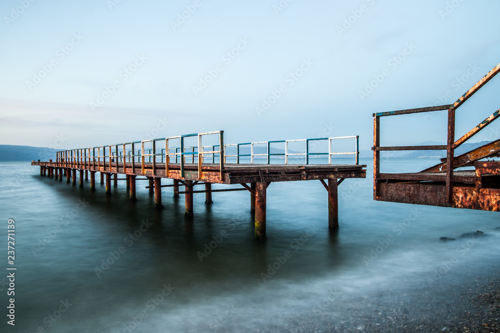 Metal pier in lake