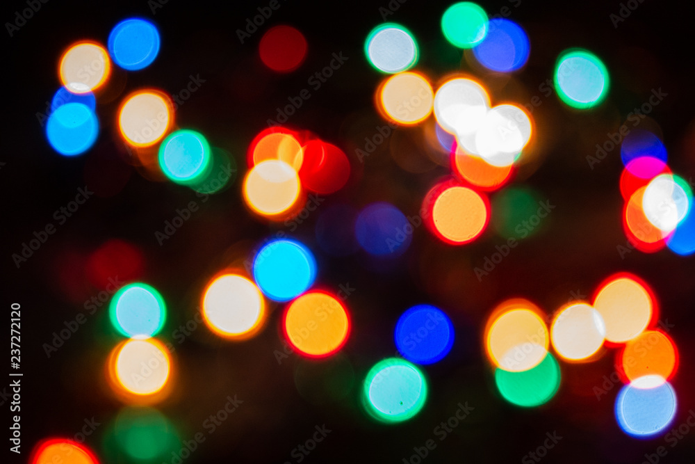 Christmas atmosphere recreated through the typical Christmas lights, with the decorated Christmas tree.