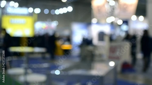 Wallpaper Mural Abstract Defocused Blurred Background flow of many people inside space shopping center or mall, exhibition, exposition, hall real time. Torontodigital.ca
