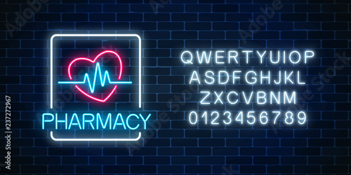 Neon pharmacy glowing signboard with heart shape and pulse graph with alphabet Illuminated drugstore sign open 24 hours