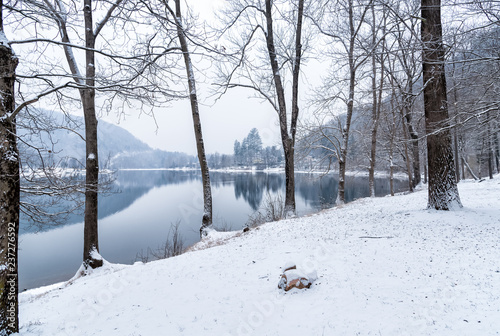Landscape of frozen Lake Ghirla on a cold winter day, Valganna, Province of Varese, Italy
