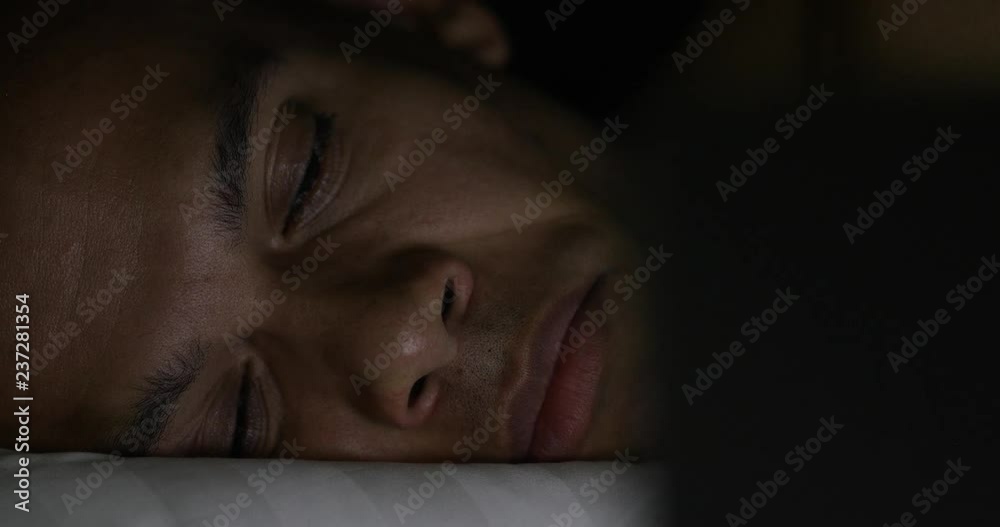 Young man at home falls asleep watching something Young man at home falls asleep watching something