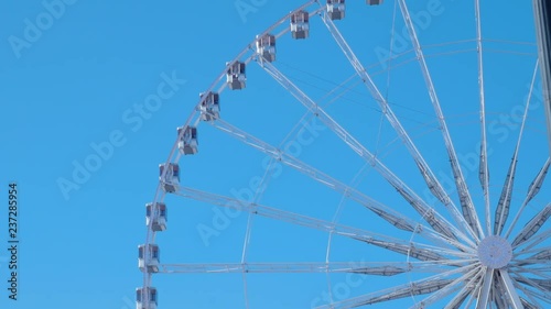 Ferris wheel turning around at Place de la Concorde in Paris, France photo