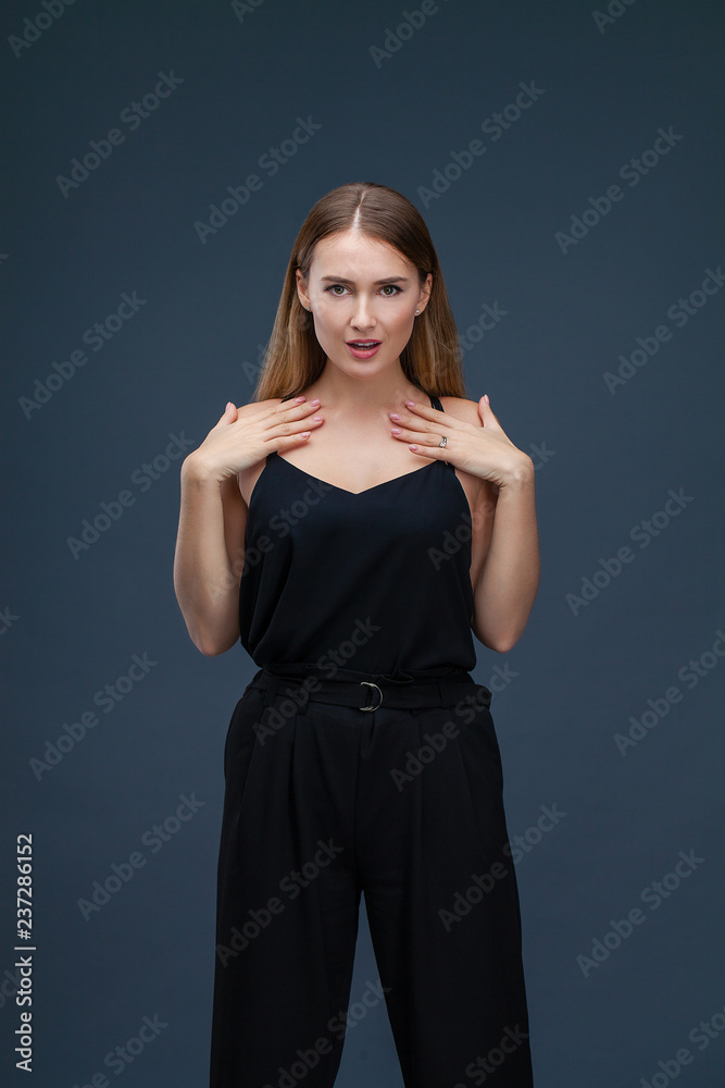 Beautiful blonde woman in black dress Beautiful blonde woman in black dress