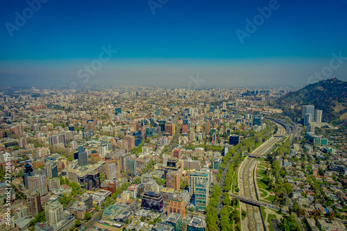 Outdoor gorgeous landscape view of Santiago of Chile with a canal of water, viewed from Cerro San Cristobal, Chile