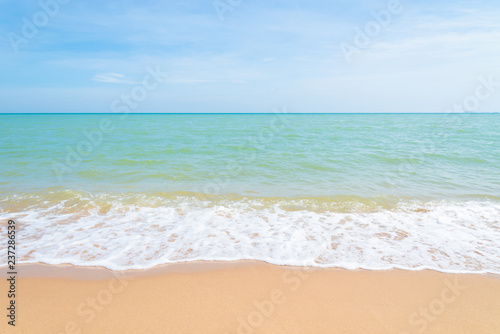 Abstract beach background. Yellow sand  blue sky and calm tropical beach landscape.Exotic nature concept.Location Satheep Thailand