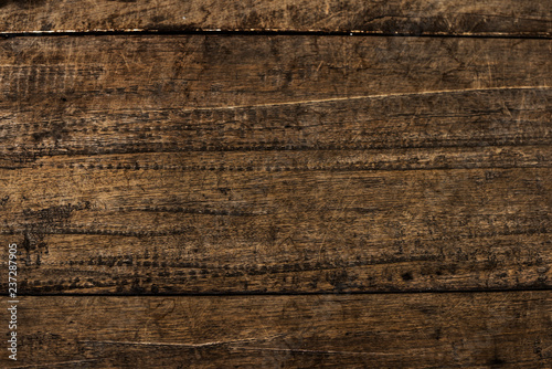 Close up of a brown wooden floorboard textured background