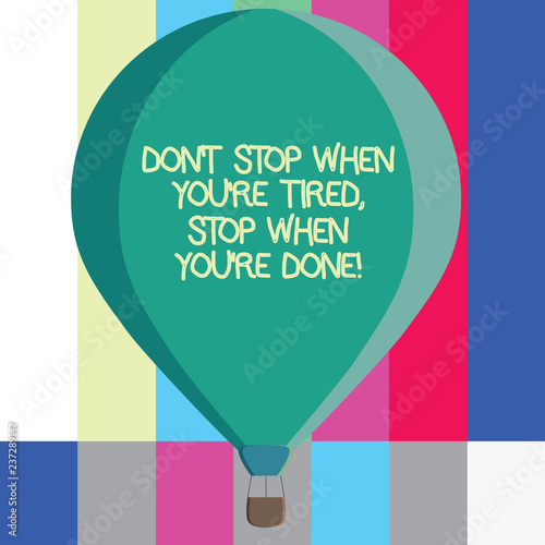 Word writing text Don T Stop When You Re Tired Stop When You Re Done. Business concept for Motivation to finish Three toned Color Hot Air Balloon afloat with Basket Tied Hanging under it