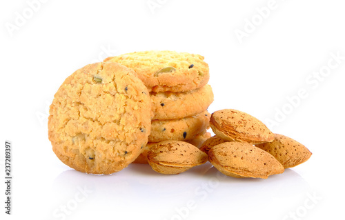 Crackers, grains and almonds on white background