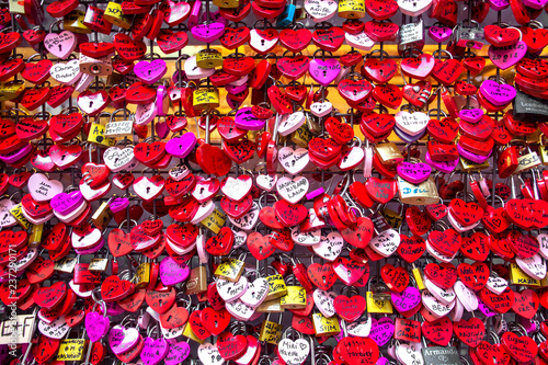 Juliet's House In Verona, Italy. Many colourful love padlocks at the wall of Juliet's house, Verona, Italy. romantic pattern