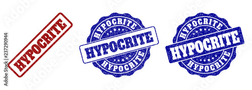 HYPOCRITE scratched stamp seals in red and blue colors. Vector HYPOCRITE labels with distress style. Graphic elements are rounded rectangles, rosettes, circles and text labels.