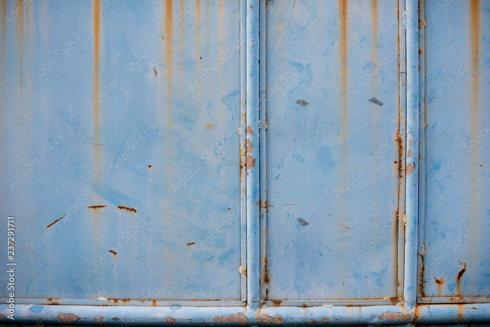 A close up of blue rustic gate with full details. A close up of blue rustic gate with full details.