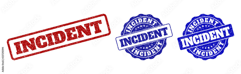 INCIDENT scratched stamp seals in red and blue colors. Vector INCIDENT labels with scratced texture. Graphic elements are rounded rectangles, rosettes, circles and text captions. INCIDENT scratched stamp seals in red and blue colors. Vector INCIDENT labels with scratced texture. Graphic elements are rounded rectangles, rosettes, circles and text captions.