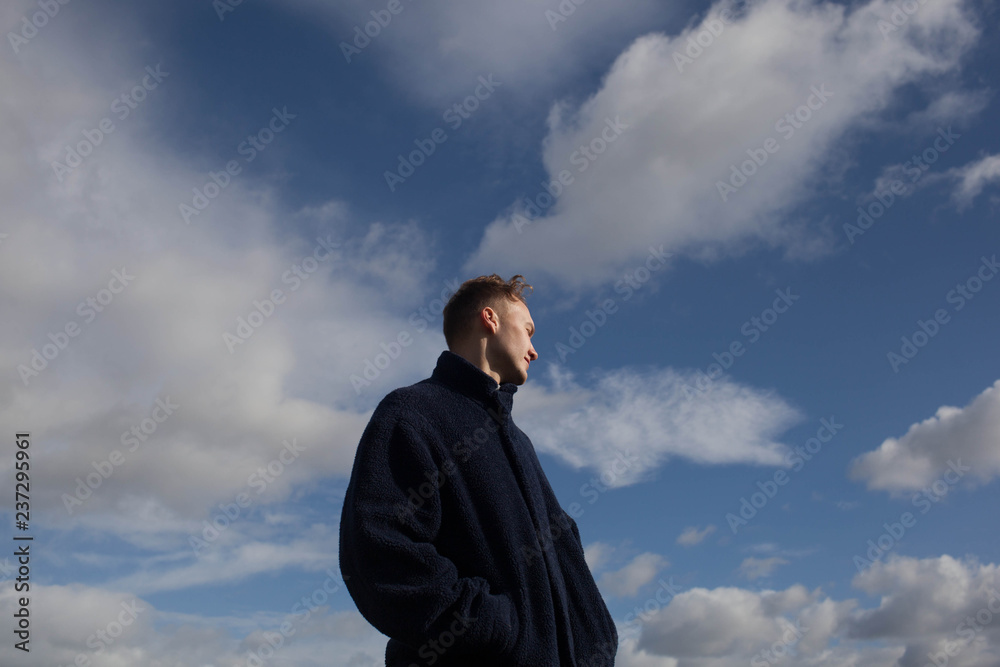 Young man and a big sky.