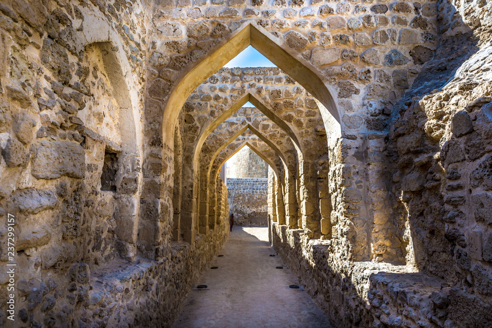The Qal'at al-Bahrain, also known as the Bahrain Fort or Portuguese Fort, is an archaeological site located in Bahrain, on the Arabian Peninsula - obrazy, fototapety, plakaty 