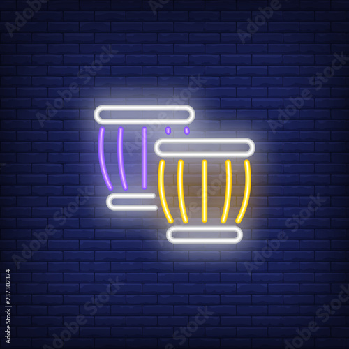 Ethnic drums neon sign. Summer and vacation design. Night bright neon sign, colorful billboard, light banner. Vector illustration in neon style.