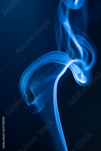 Abstract blue smoke swirls