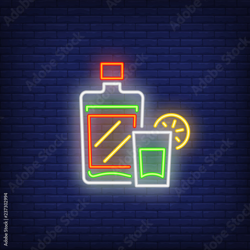 Tequila bottle and glass neon sign. Mexican alcoholic drink design. Night bright neon sign, colorful billboard, light banner. Vector illustration in neon style.