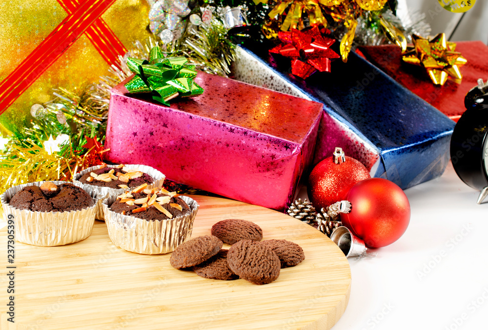 Chocolate brownie and cookei on wood plate with Christmas decoration backgrounds Chocolate brownie and cookei on wood plate with Christmas decoration backgrounds