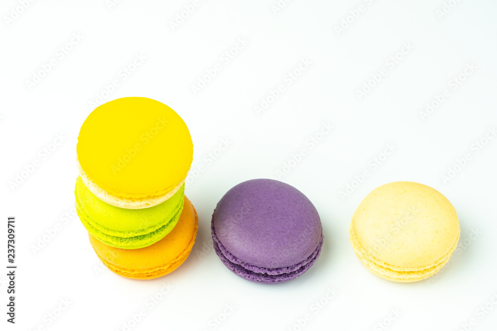 Colorful french macarons on white background. Colorful french macarons on white background.