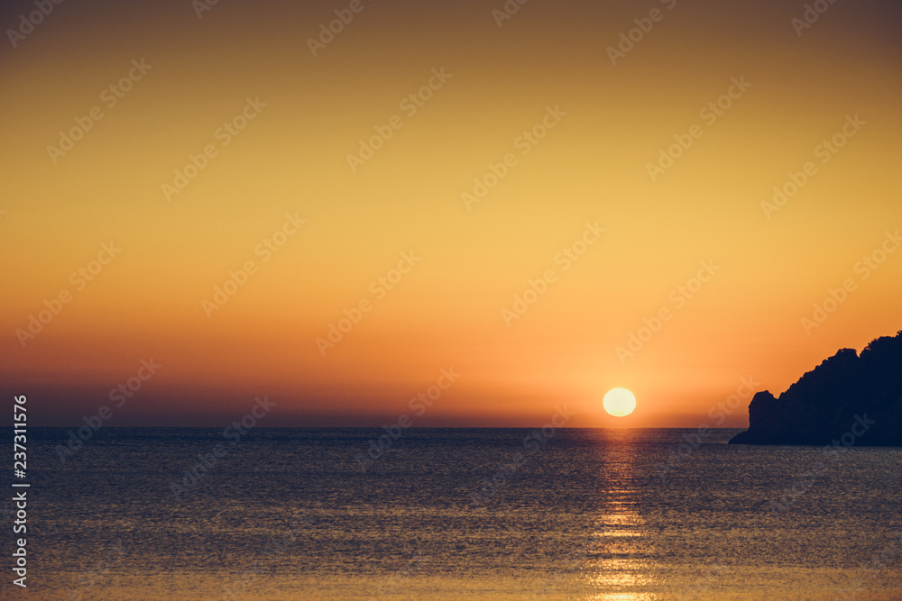 Fototapeta premium Sunset or sunrise over sea surface