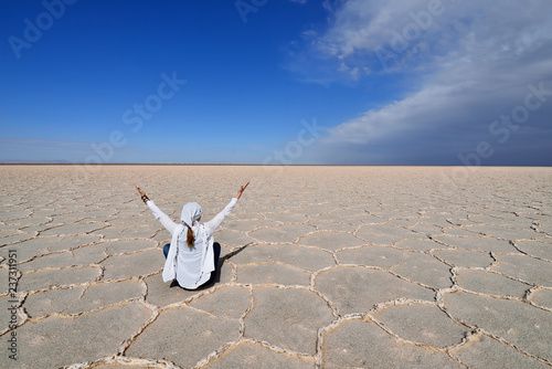 Girl on the Great Salt Desert in Iran photo