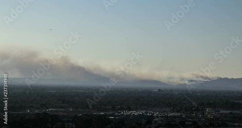 Giant wildfire burns above Los Angeles - 4k time lapse photo