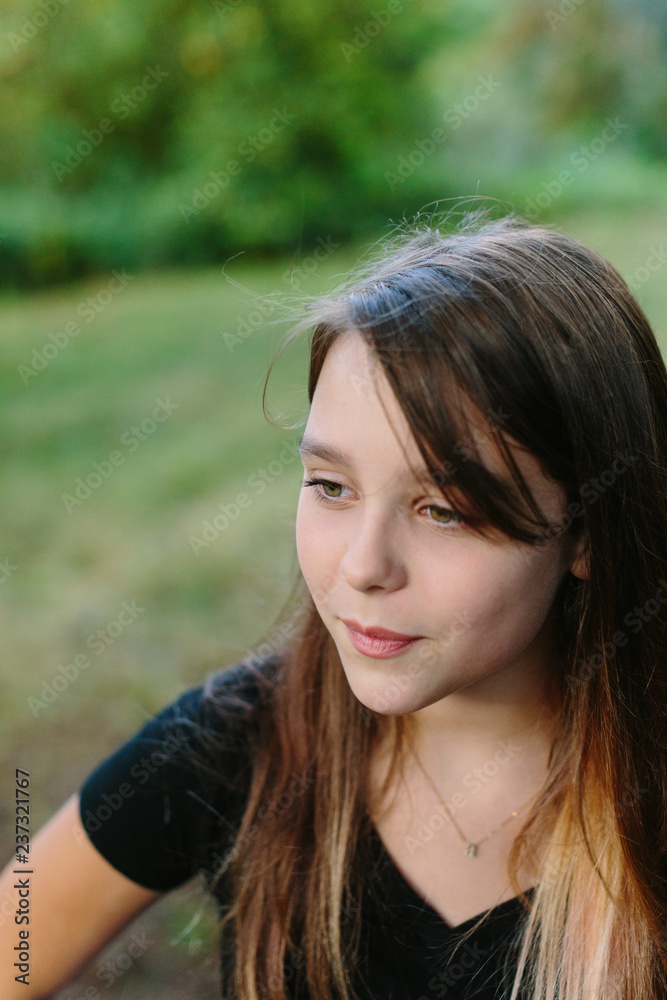 Portrait of Beautiful Young Girl Looking to Side Portrait of Beautiful Young Girl Looking to Side