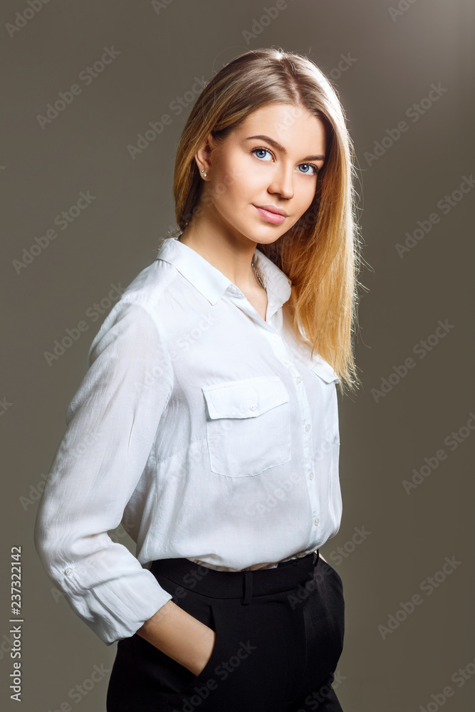 Portrait of young business woman with blonde hair. Portrait of young business woman with blonde hair.