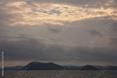 A sunset at the sea at the Rosslyn Bay Marina near Yeppoon in the Tropic of Capricorn area in Central Queensland, Australia