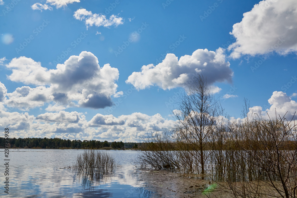 Fototapeta premium Sky and clouds reflection on water of Lake