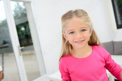 portrait of a beautiful young kid girl painting on a white paper with color paint at home Free Download portrait of a beautiful young kid girl painting on a white paper with color paint at home - GFXLoad