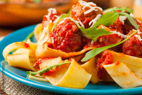 Slika na platnu Italian pasta pappardelle with meatballs in tomato sauce.