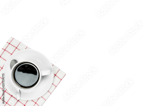 A cup of coffee and tea spoon with copy space on white background