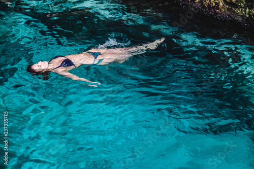 Girl at Hoyo Azul in Punta Cana, Dominican Republic