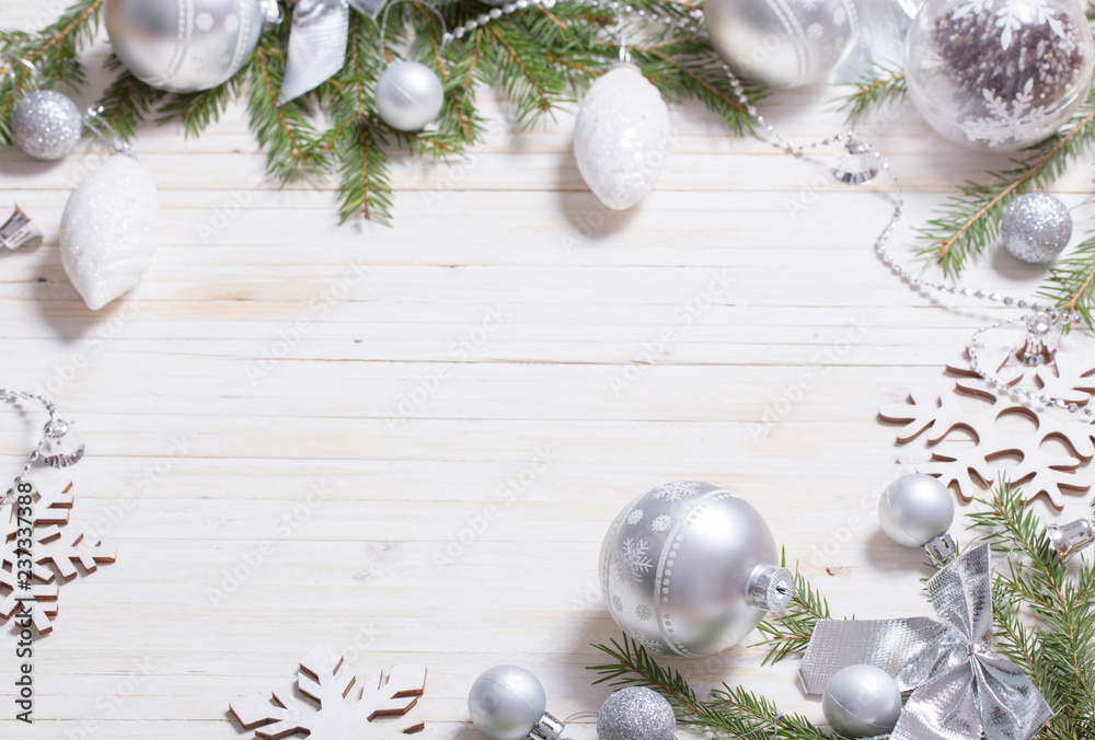 Silver Christmas decoration on wooden background Silver Christmas decoration on wooden background