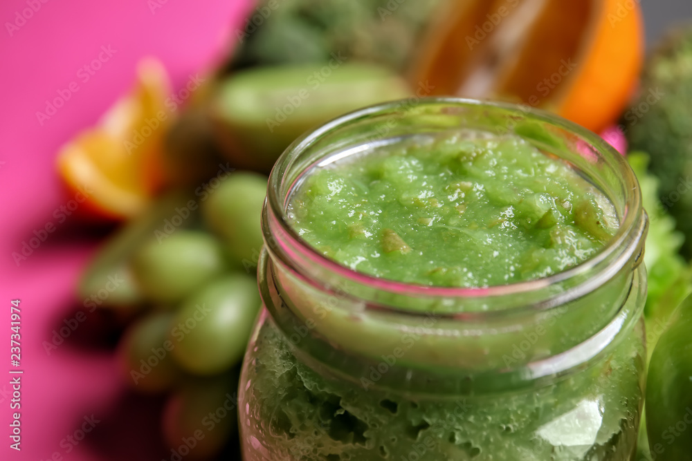 Mason jar of tasty green smoothie, closeup Mason jar of tasty green smoothie, closeup