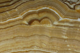 Natural stone Onyx yellow-brown color with a beautiful pattern