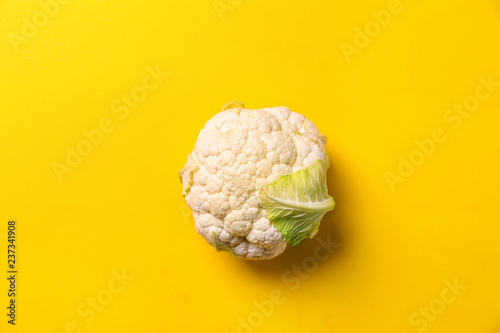 Fotografía Fresh cauliflower on color background, top view
