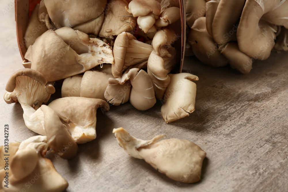 Fototapeta premium Oyster mushrooms on wooden table