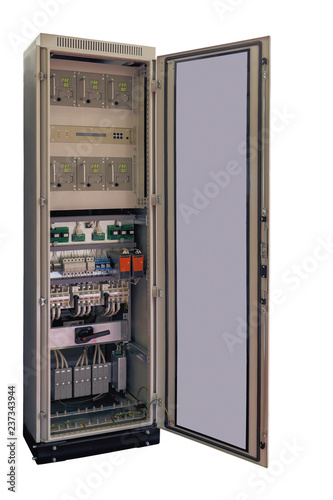 modern electrical control cabinet with open front door, close-up