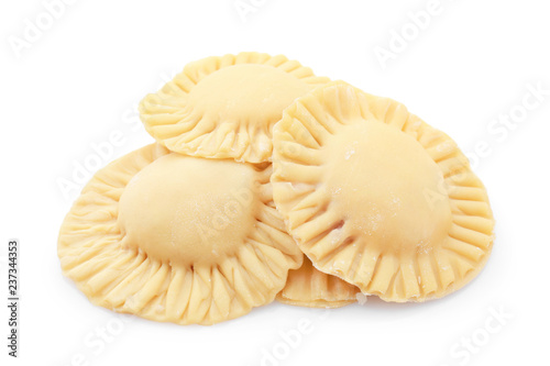 Raw ravioli on white background