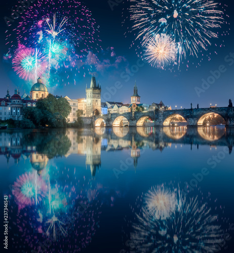 Photography Beautiful fireworks above Charles bridgeat at night, Prague, Czech Republic