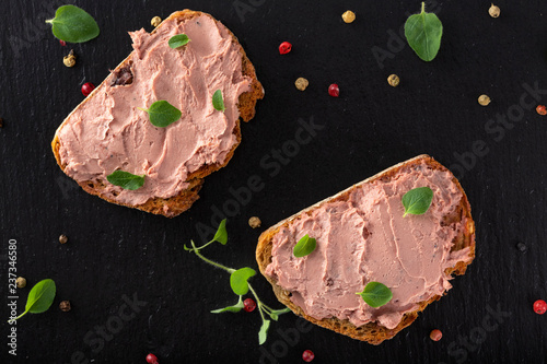 Open sandwiches with pate made from pork and turkey liver with sweet cranberry jam