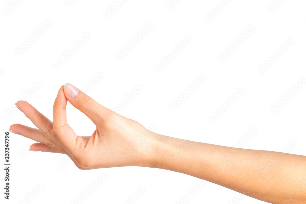Woman hand holding something with two fingers Woman hand holding something with two fingers